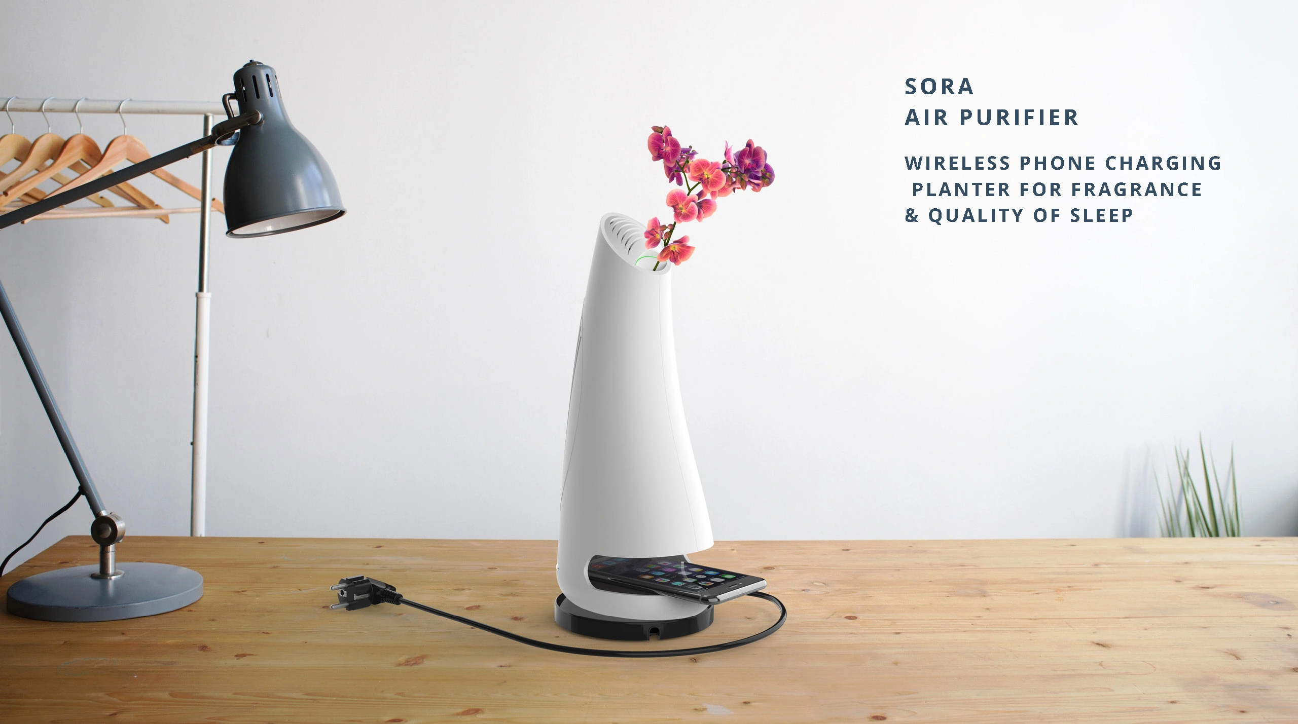 Sora multifunctional air purifier concept with a built-in planter and phone charging base